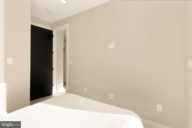 bedroom featuring recessed lighting