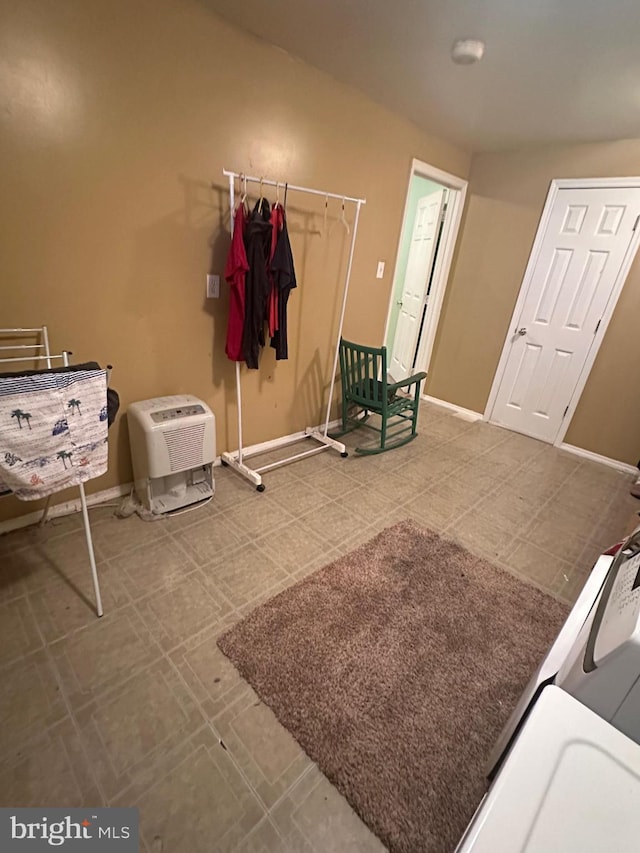 interior space with baseboards