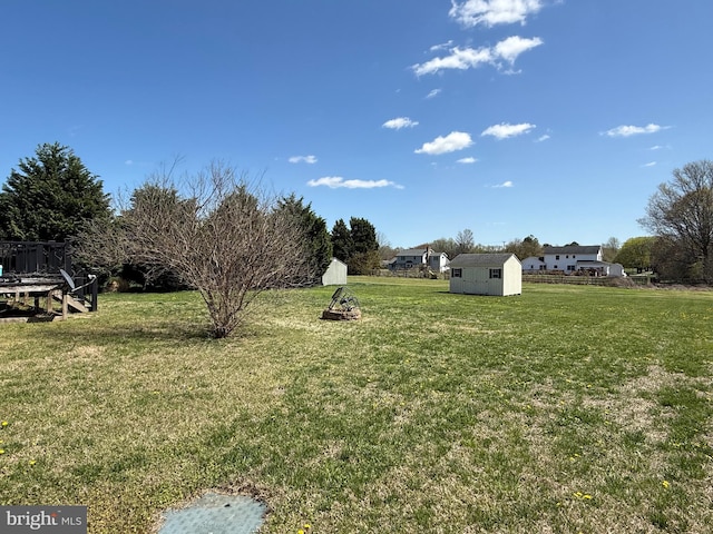 97 S Nightingale Dr, Milford, DE 19963 - view of yard with a storage shed and an outbuilding