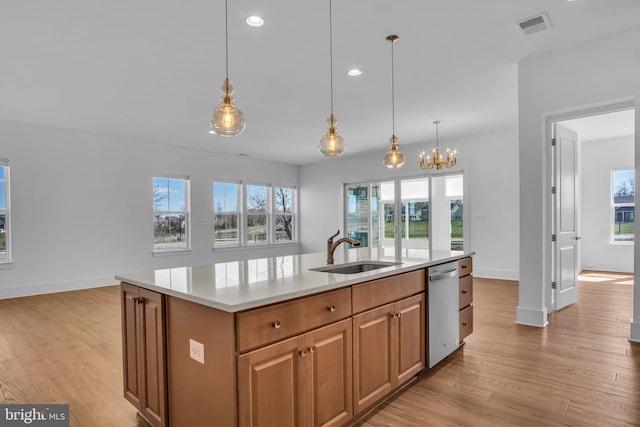 85 Quiet Creek Dr, Gettysburg, PA 17325 - kitchen with visible vents, a sink, light countertops, light wood finished floors, and stainless steel dishwasher