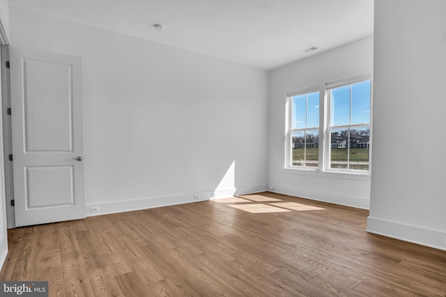 85 Quiet Creek Dr, Gettysburg, PA 17325 - unfurnished room featuring visible vents, baseboards, and wood finished floors