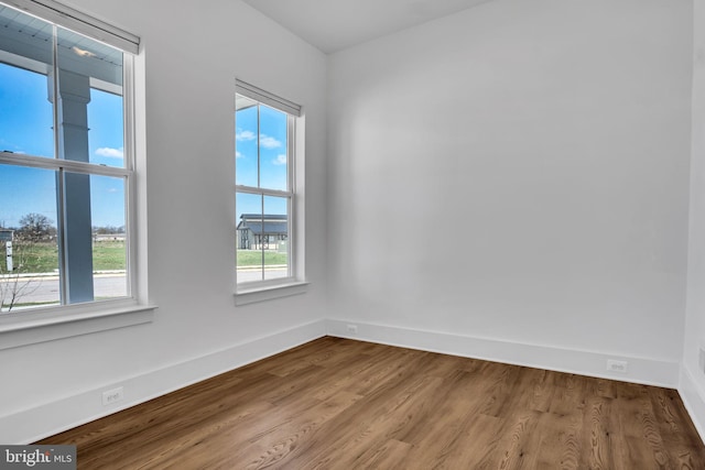 85 Quiet Creek Dr, Gettysburg, PA 17325 - unfurnished room with baseboards, plenty of natural light, and wood finished floors