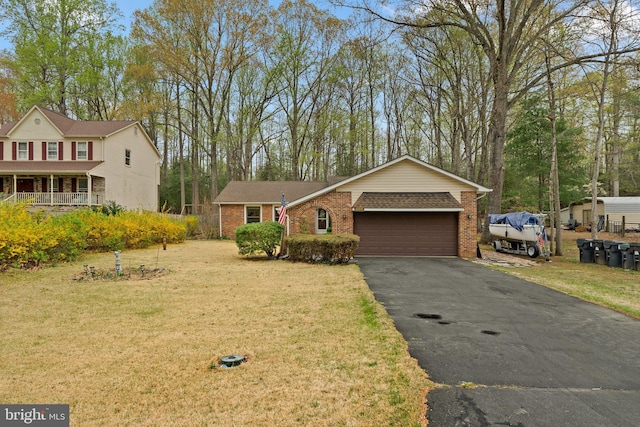 2200 Harpoon Dr, Stafford, VA 22554 - view of front of house featuring brick siding, a garage, driveway, and a front lawn