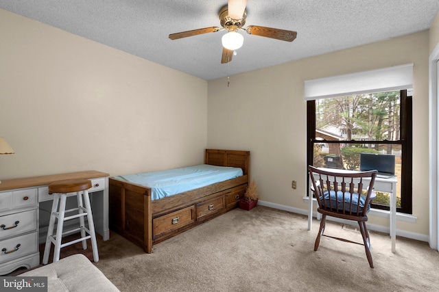2200 Harpoon Dr, Stafford, VA 22554 - bedroom featuring light colored carpet, a desk, a textured ceiling, and baseboards
