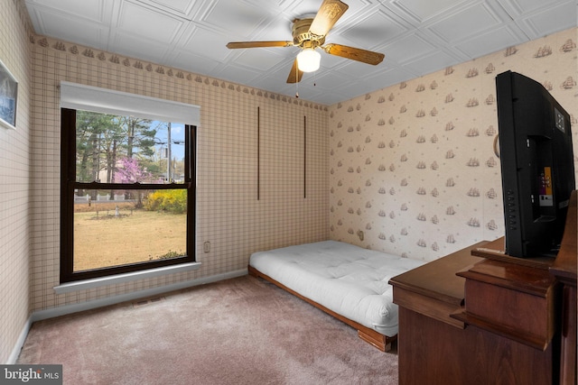 2200 Harpoon Dr, Stafford, VA 22554 - unfurnished bedroom featuring wallpapered walls, carpet floors, and a ceiling fan