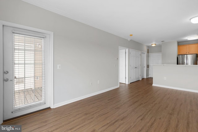 3830 Lightfoot St Unit 335, Chantilly, VA 20151 - unfurnished living room with baseboards, ornamental molding, and wood finished floors