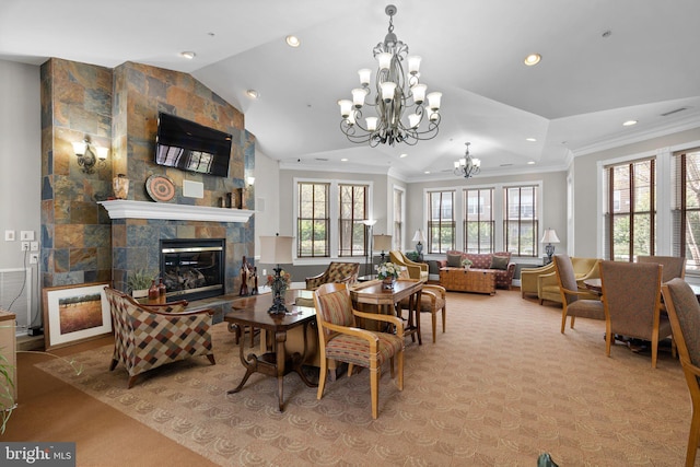 3830 Lightfoot St Unit 335, Chantilly, VA 20151 - carpeted living area with crown molding, a fireplace, vaulted ceiling, an inviting chandelier, and recessed lighting