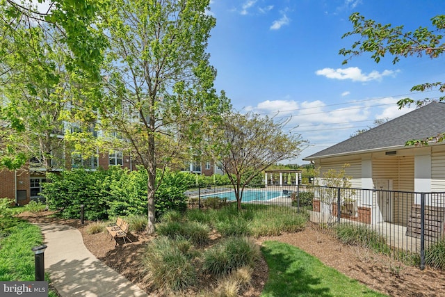 3830 Lightfoot St Unit 335, Chantilly, VA 20151 - view of yard with fence and a fenced in pool