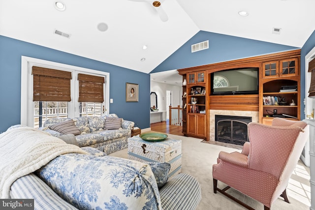 living room featuring visible vents, recessed lighting, and lofted ceiling