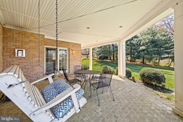 view of patio with outdoor dining area
