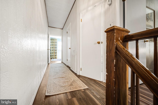 hallway with wood finished floors