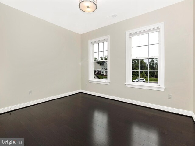 6451 Dresden Pl, Frederick, MD 21701 - unfurnished room featuring baseboards and dark wood-type flooring