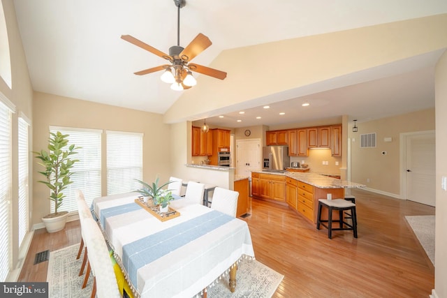 869 Bourban Ln, West Grove, PA 19390 - dining space featuring a ceiling fan, light wood-type flooring, recessed lighting, and high vaulted ceiling
