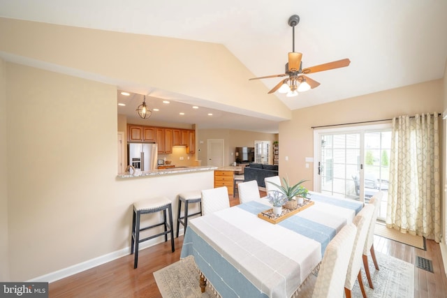 869 Bourban Ln, West Grove, PA 19390 - dining room featuring light wood finished floors, recessed lighting, ceiling fan, and high vaulted ceiling