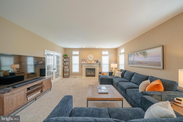 869 Bourban Ln, West Grove, PA 19390 - living room with a fireplace with flush hearth, carpet floors, french doors, and recessed lighting