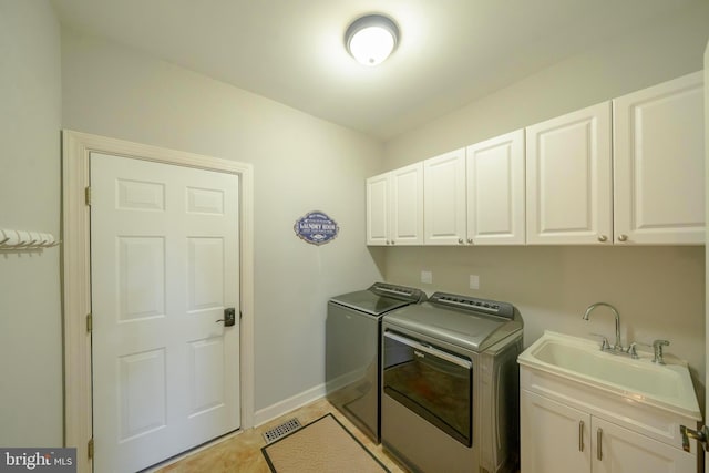 869 Bourban Ln, West Grove, PA 19390 - washroom with washing machine and clothes dryer and cabinet space