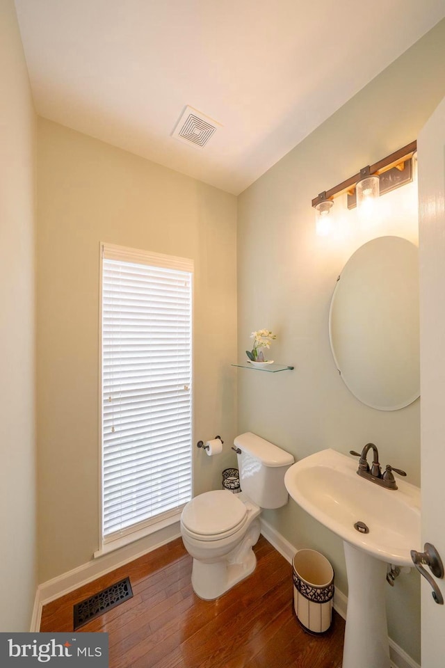 869 Bourban Ln, West Grove, PA 19390 - bathroom with hardwood / wood-style flooring and plenty of natural light