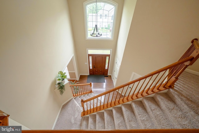 869 Bourban Ln, West Grove, PA 19390 - carpeted foyer entrance with stairs and a high ceiling