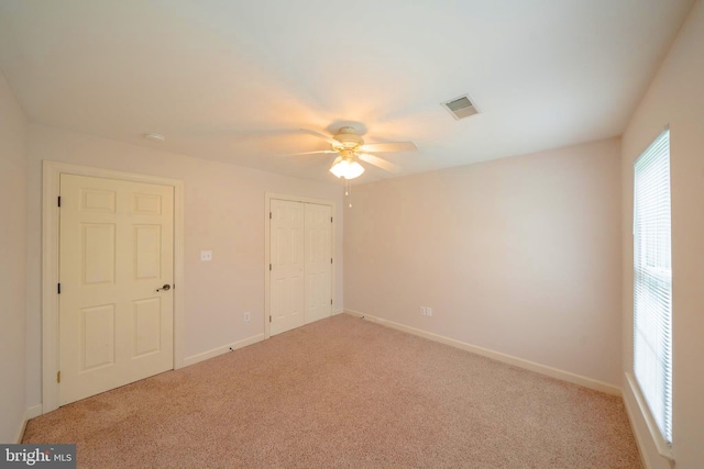 869 Bourban Ln, West Grove, PA 19390 - unfurnished bedroom with light carpet, a closet, and ceiling fan