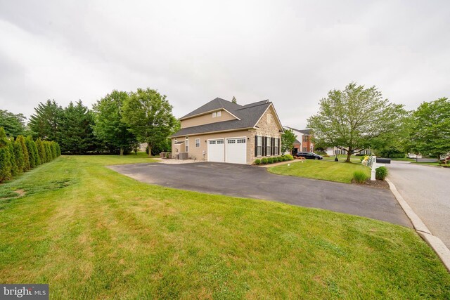 869 Bourban Ln, West Grove, PA 19390 - view of front of home with driveway and a front yard