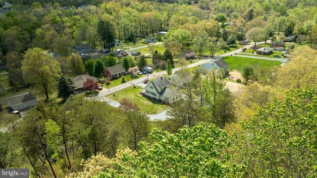 bird's eye view featuring a residential view and a view of trees