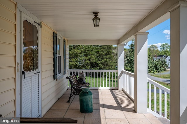 balcony featuring a porch