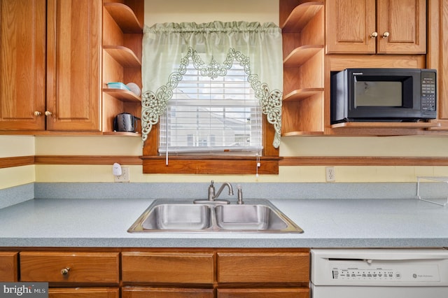kitchen with dishwasher, black microwave, open shelves, and a sink