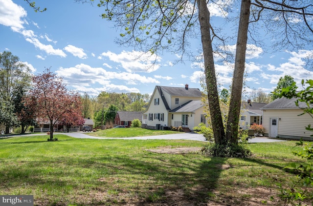 exterior space featuring a yard