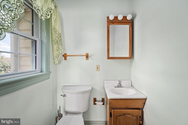half bath with toilet and vanity