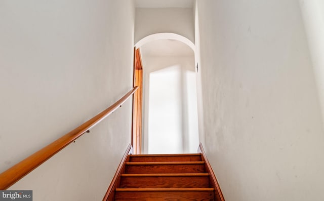 stairs featuring arched walkways
