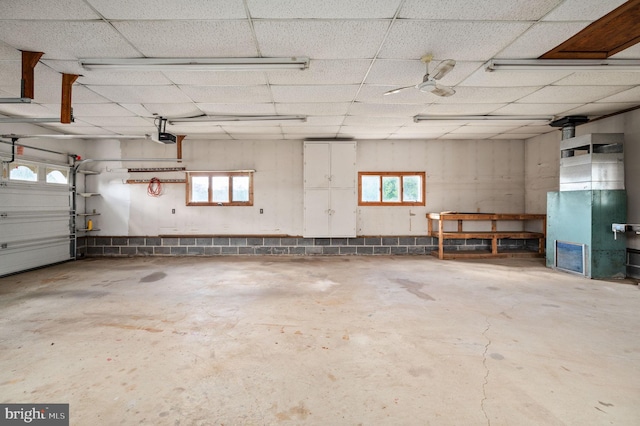 garage with heating unit and a garage door opener