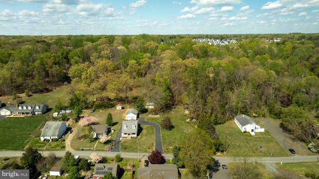 aerial view featuring a forest view