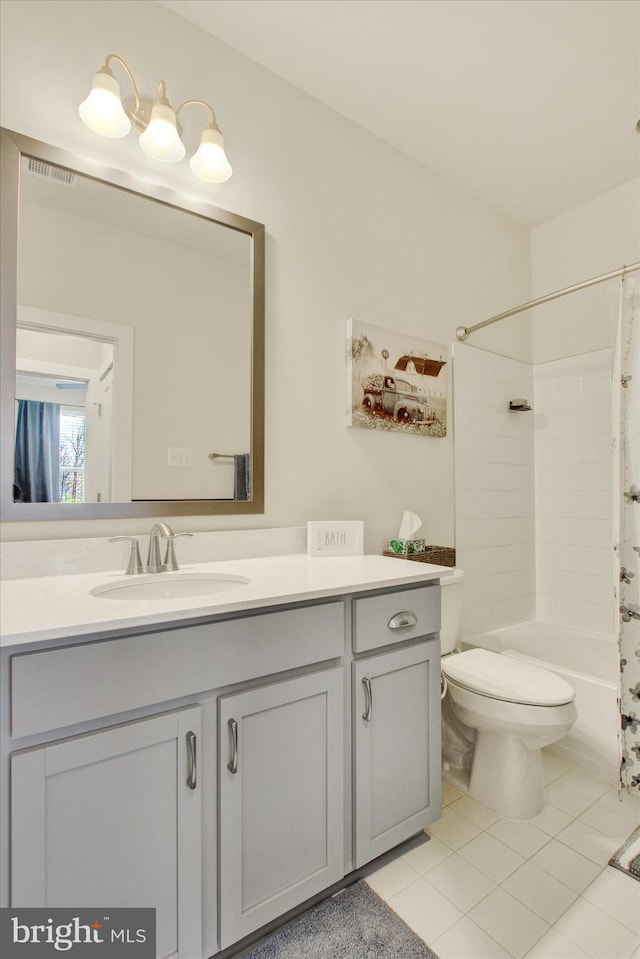 full bath featuring toilet, shower / bath combo, vanity, and tile patterned flooring