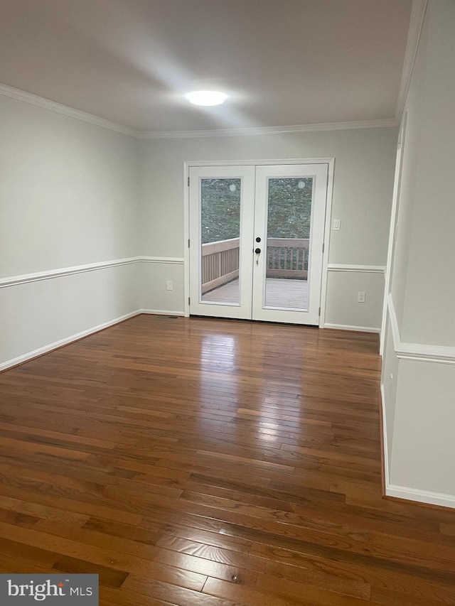 15712 Brandywine Rd, Dumfries, VA 22025 - unfurnished room featuring dark wood-style flooring, crown molding, french doors, and baseboards