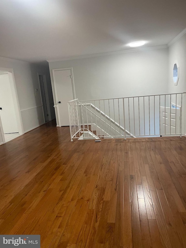 15712 Brandywine Rd, Dumfries, VA 22025 - unfurnished room with wood-type flooring and crown molding