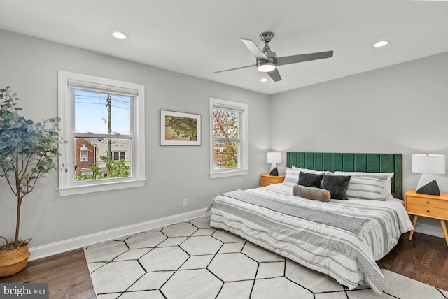 bedroom with recessed lighting, baseboards, ceiling fan, and wood finished floors