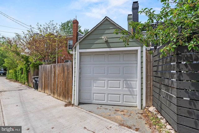 garage with fence