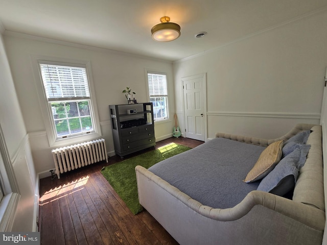 2531 Pickwick Rd, Baltimore, MD 21207 - bedroom with visible vents, dark wood-type flooring, ornamental molding, and radiator
