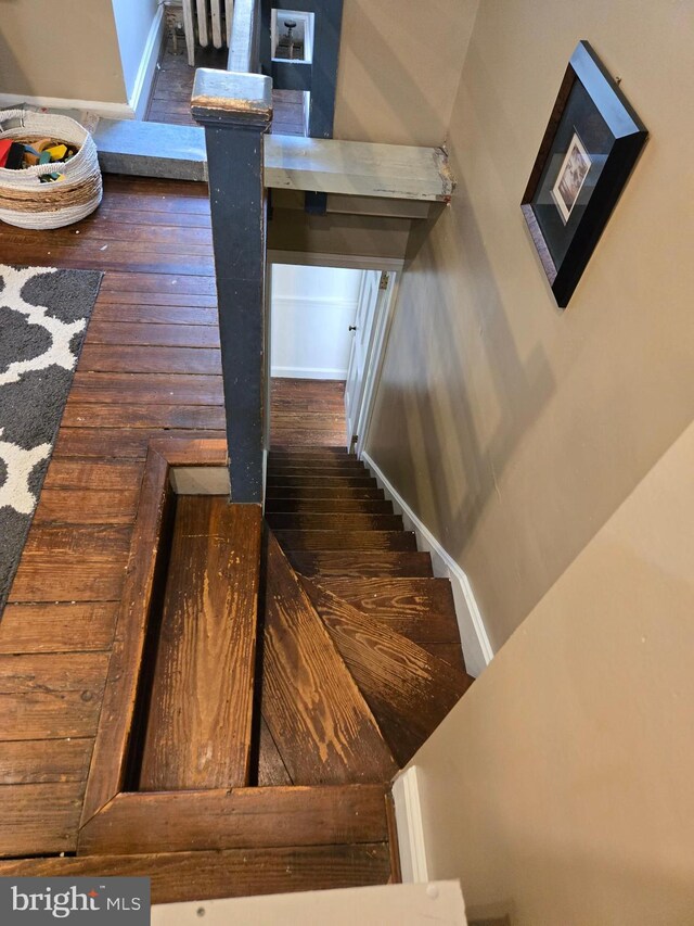 2531 Pickwick Rd, Baltimore, MD 21207 - stairway featuring wood finished floors