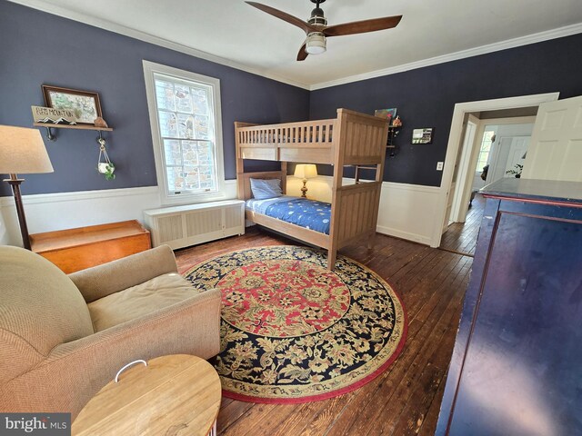 2531 Pickwick Rd, Baltimore, MD 21207 - bedroom with radiator heating unit, hardwood / wood-style floors, crown molding, and a wainscoted wall