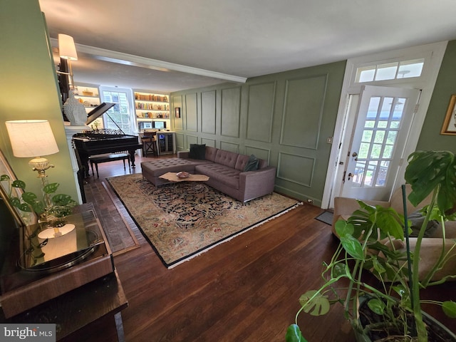 2531 Pickwick Rd, Baltimore, MD 21207 - living area featuring dark wood finished floors and a decorative wall