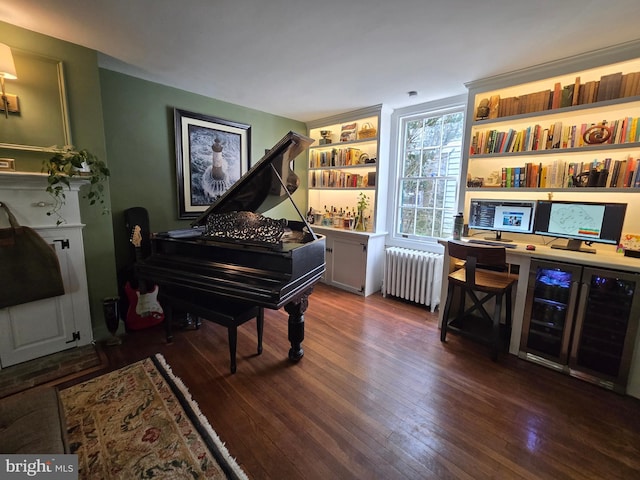 2531 Pickwick Rd, Baltimore, MD 21207 - sitting room featuring hardwood / wood-style flooring, radiator heating unit, and built in features