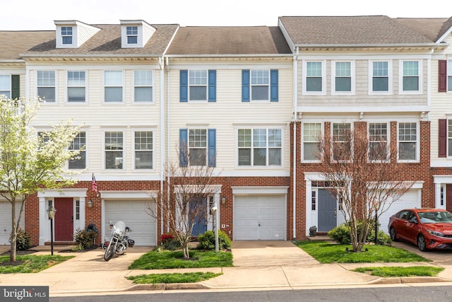 8114 Rainwater Cir, Manassas, VA 20111 - view of property featuring an attached garage, driveway, roof with shingles, and brick siding