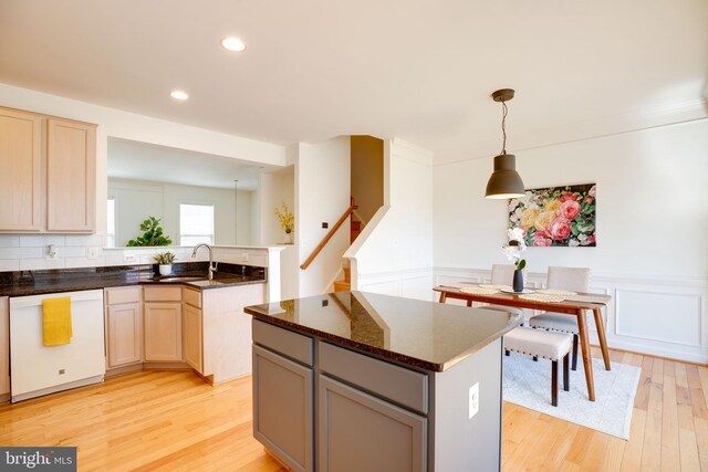 8114 Rainwater Cir, Manassas, VA 20111 - kitchen featuring a sink, wainscoting, light wood-type flooring, dishwasher, and recessed lighting