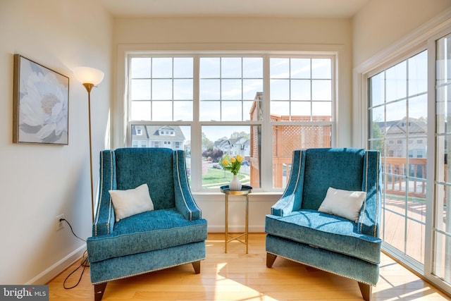 8114 Rainwater Cir, Manassas, VA 20111 - sitting room with wood finished floors and baseboards