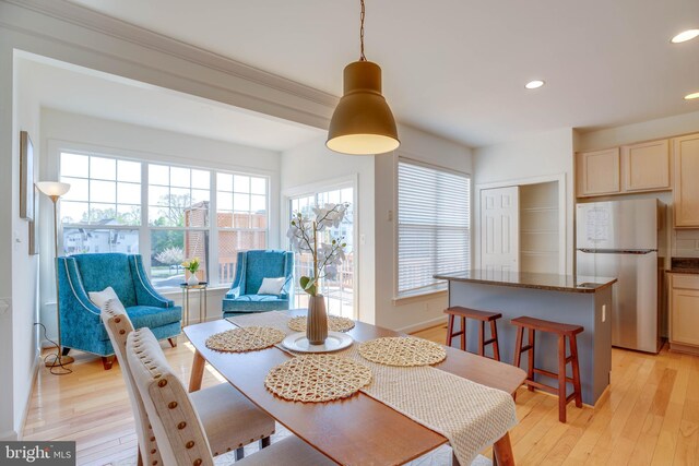 8114 Rainwater Cir, Manassas, VA 20111 - dining room featuring light wood finished floors and recessed lighting