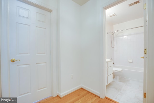8114 Rainwater Cir, Manassas, VA 20111 - interior space featuring baseboards, vanity, visible vents, and shower / bathing tub combination