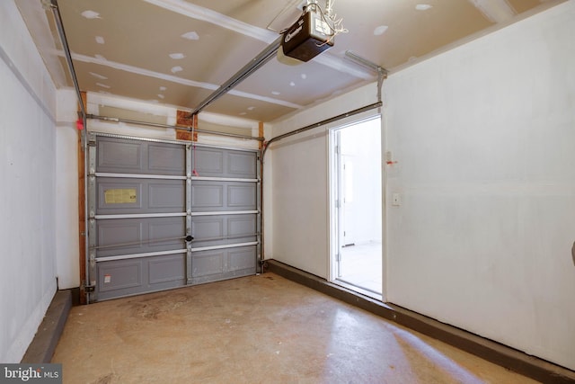 8114 Rainwater Cir, Manassas, VA 20111 - garage featuring a garage door opener