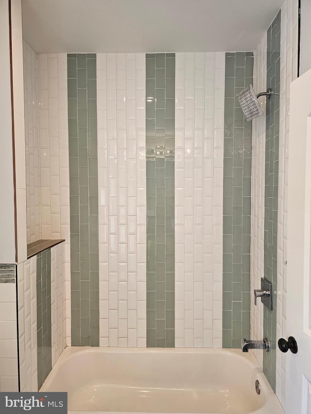 bathroom featuring washtub / shower combination