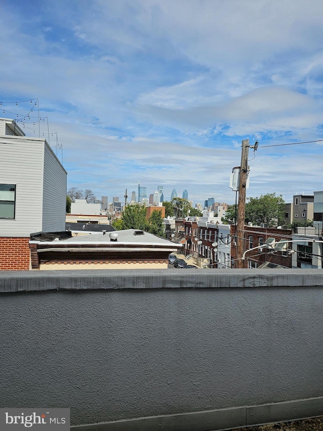balcony featuring a view of city